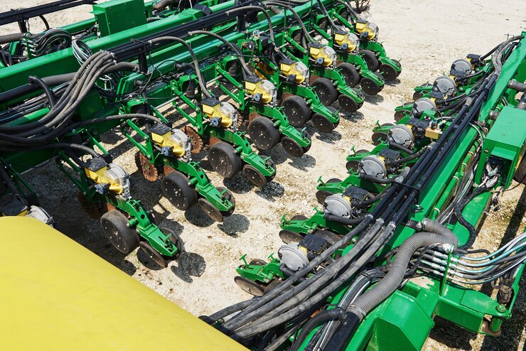 close-up-seeder-attached-tractor-field